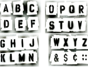 Full alphabet stencil set.  Sprayed with black spray paint on white background.  Great for grunge designs, paint is runny spotted.